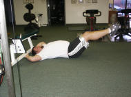 abdominal strength training; leg raises