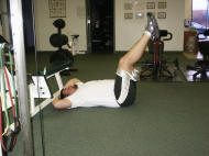 abdominal strength training; leg raises